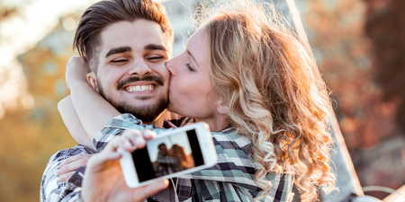 Happy couples are less likely to share photos of their partner on social media, study says