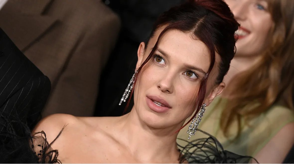 Actress Millie Bobby Brown achieved her chic Stranger Things premiere look with the help of The Smooth Company/